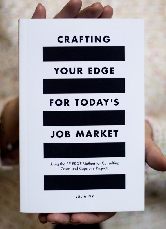 Julia Ivy holding her book, Crafting Your Edge for Today’s Job Market